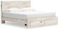 Lawroy King Panel Storage Bed with Mirrored Dresser and Nightstand