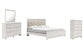 Altyra King Panel Bed with Mirrored Dresser and Chest