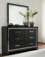 Kaydell Queen Upholstered Panel Storage Bed with Mirrored Dresser and Chest